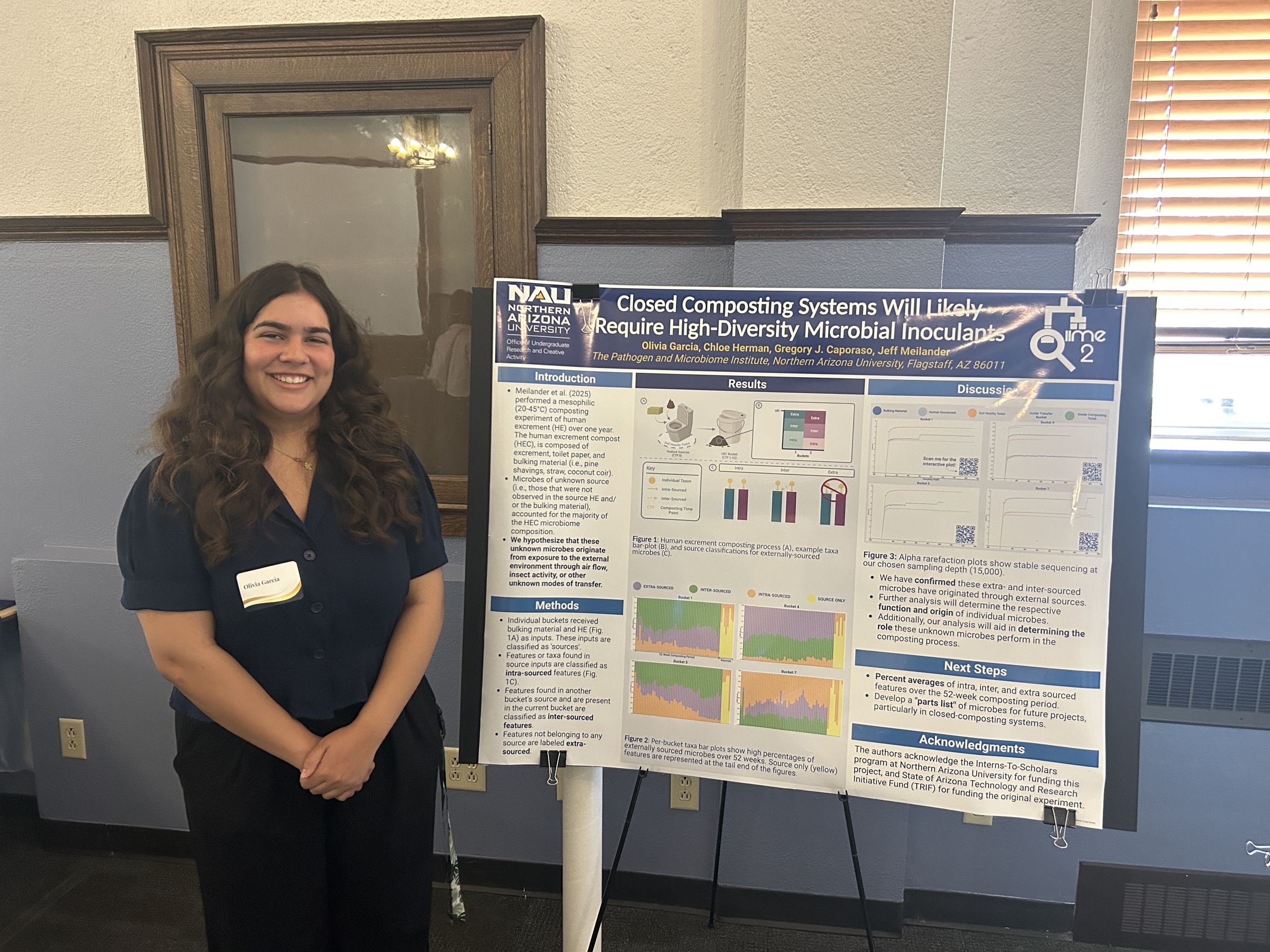 Olivia with her research poster